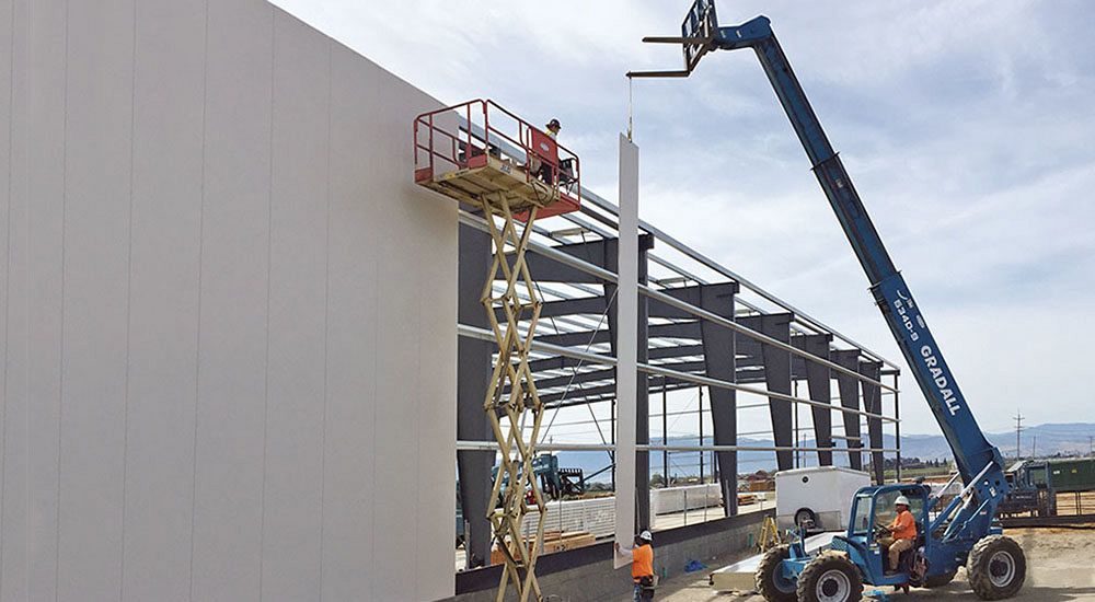 Insulated metal panels on seed processing warehouse expansion building