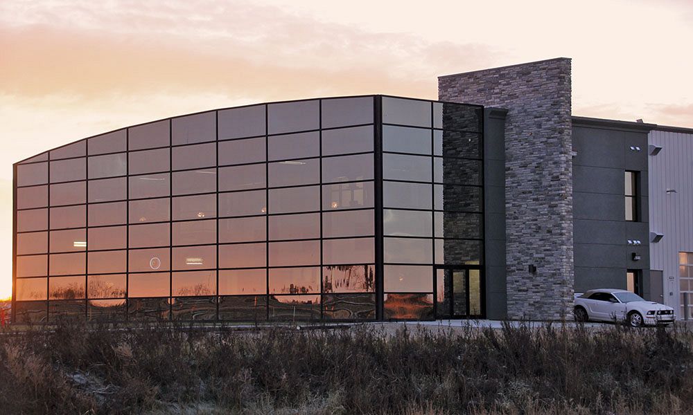 Custom steel building with glass curtain wall