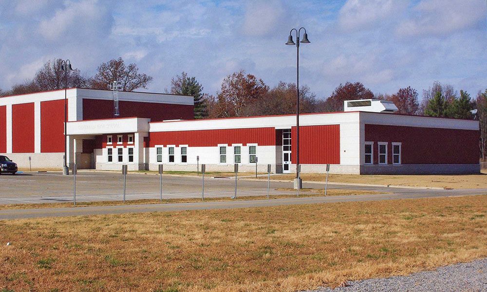 School gymnasium metal building expansion