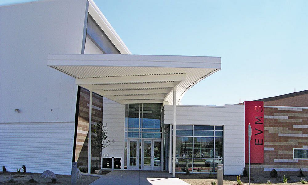 Skewed wall entrance to school gymnasium