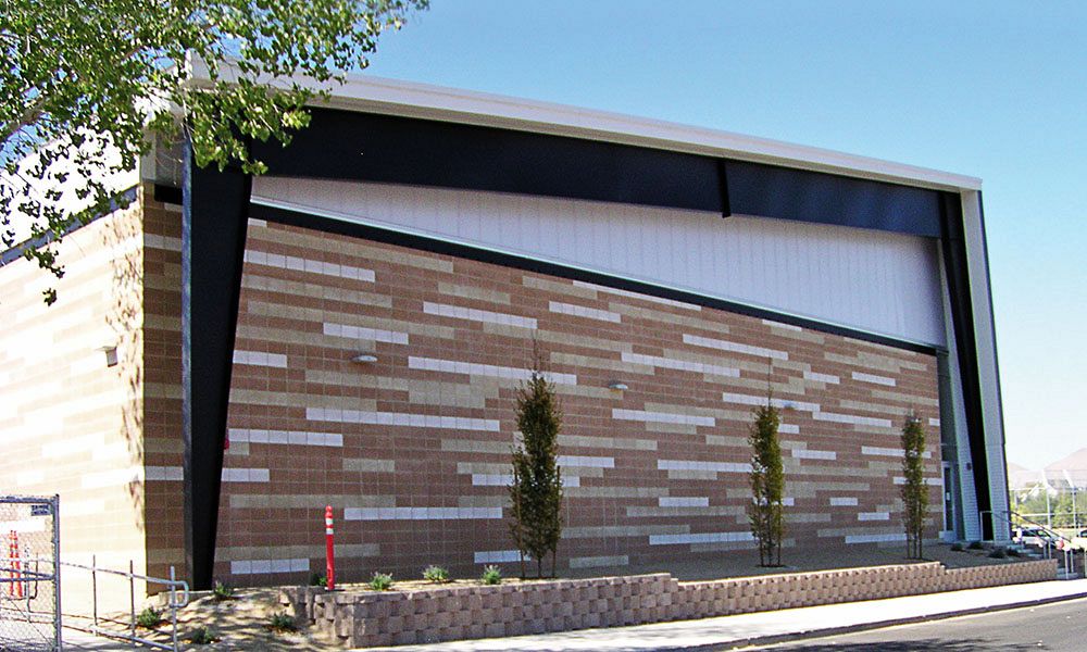 Exposed exterior steel on school gymnasium