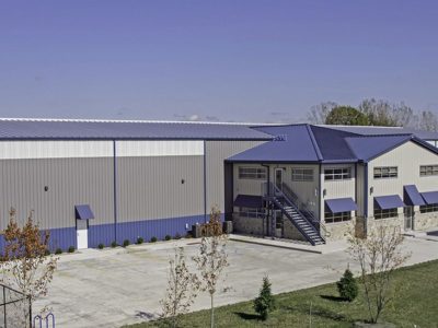 Office with full mezzanine attached to equipment repair building
