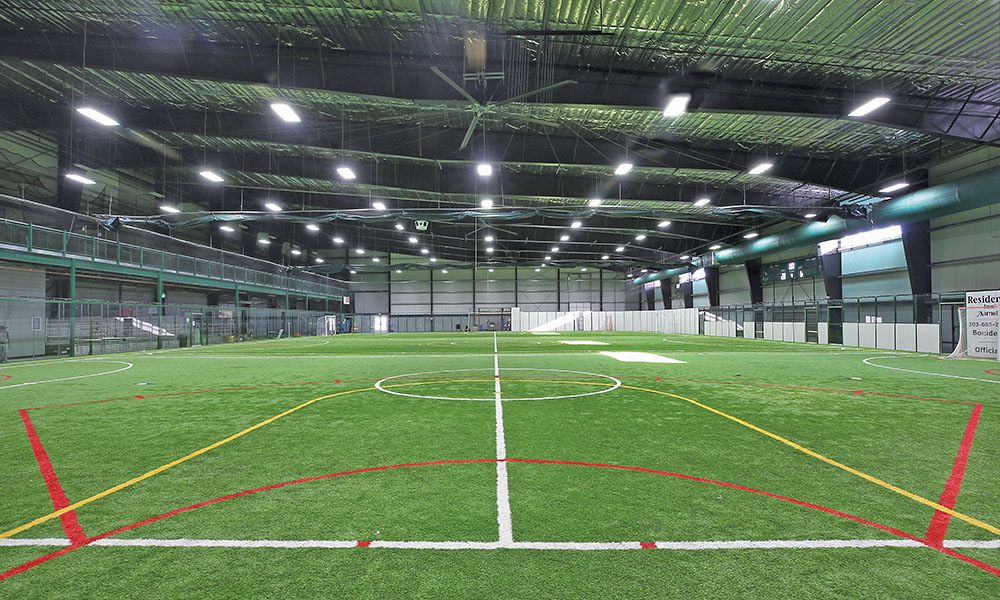 Soccer field interior of athletic steel building