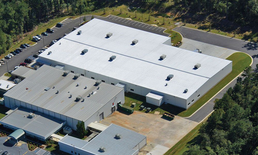 Aerial view of steel building manufacturing plant expansion