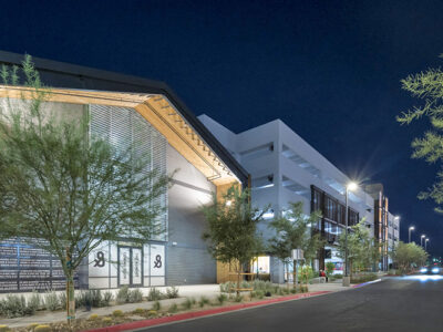 Steel building complex of offices, retail, markets, and cafe