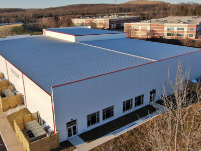 Steel church building with parapet walls