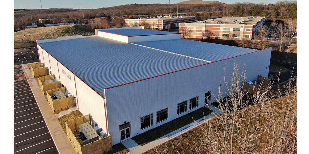 Steel church building with parapet walls