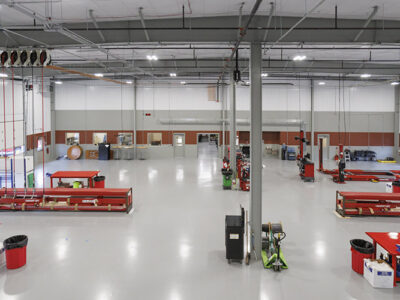 Construction maintenance building with cranes