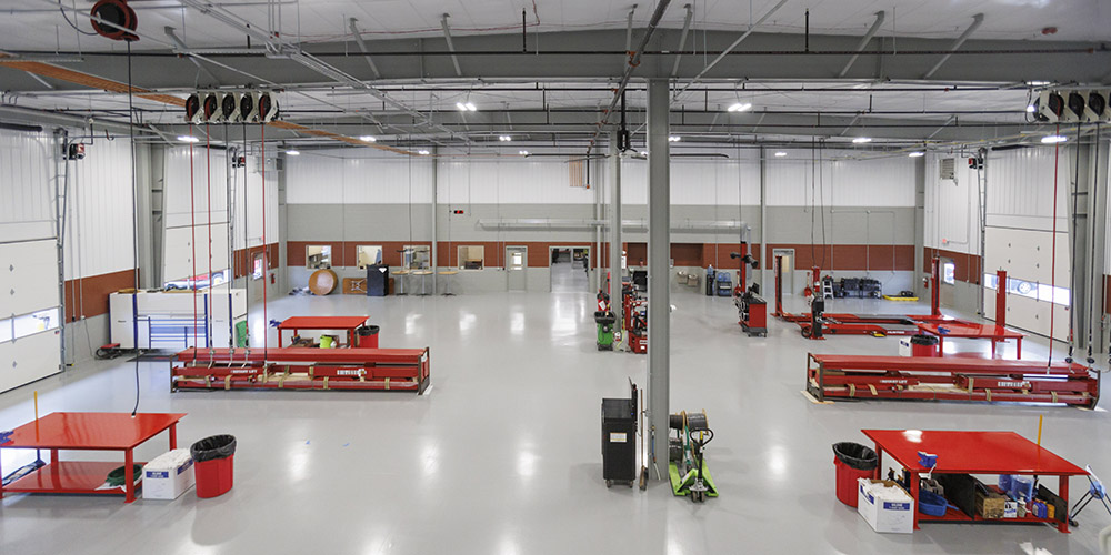 Construction maintenance building with cranes