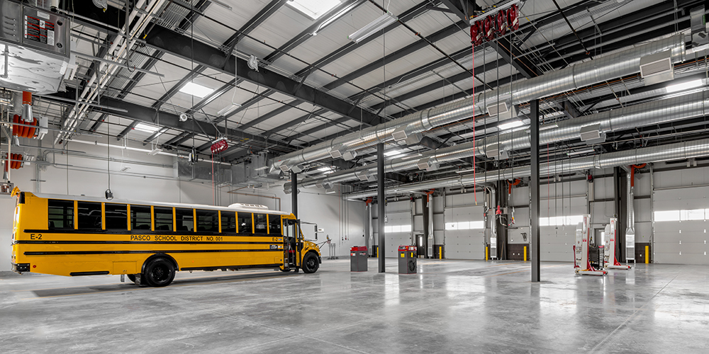 School transportation & maintenance building with office